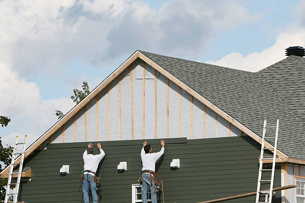 Professional Vinyl Siding technician working in Troy, IL